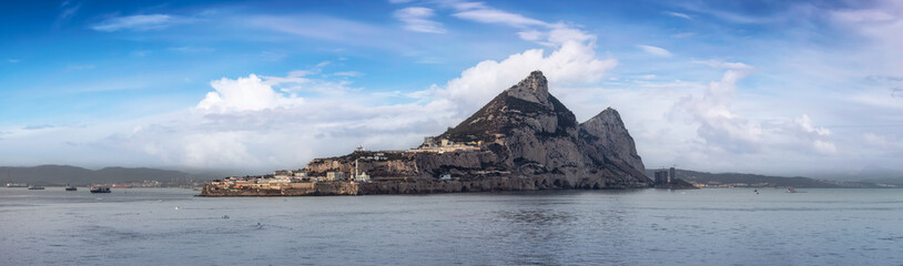 City Buildings, Homes and Mountain by the Sea. Cloudy Sunny Sky Art Render. Gibraltar, United Kingdom. Panorama