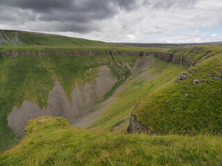 View up to High Cup Nick from the edge of High Cup Gill chasm, Eden Valley, North Pennines,...