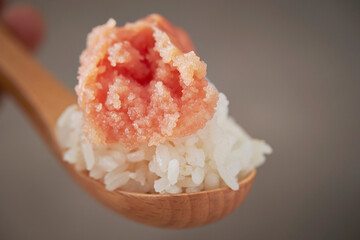 Fototapeta na wymiar Close-up of salted pollack roe over cooked rice