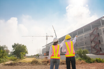 Engineer Construction  concept,Asian engineer construction teamwork  standing on site construction building background, Engineer Construction  design for Business building construction project