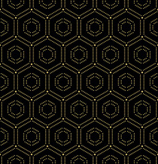 Geometric repeating ornament with hexagonal dotted elements. Geometric modern dotted golden ornament. Seamless abstract modern pattern