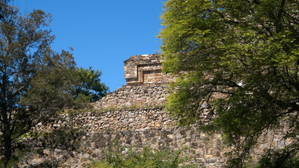 Fototapeta na wymiar Side view of a structure in the ruins at Monte Alban, in Oaxaca, Mexico