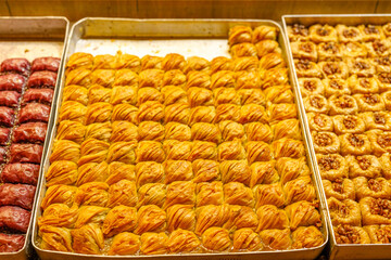 Traditional Turkish dessert baklawa in different flavors and styles in the Egyptian bazaar in Istanbul