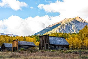 Aspen, Colorado Ashcroft Ghost Town in Castle Creek abandoned wooden house cabins with yellow...