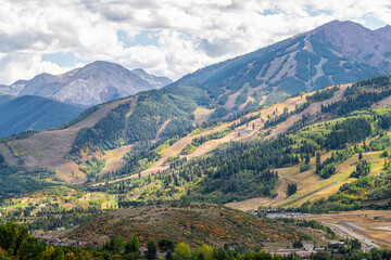 Fototapeta premium Aspen, Colorado rocky mountains wide angle view of storm clouds by Buttermilk mountain ski resort slopes in summer at Roaring fork valley