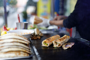 Best Street Food in Istanbul. Preparing the famous Balik Ekmek or Fish Sandwich
