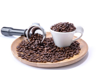 Brown roasted coffee beans in the white cup and on the potta filter on the wood tray isolated on white background