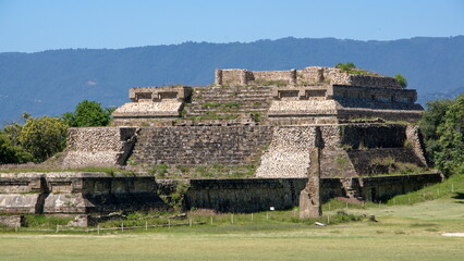 Low, stepped pyramid in the ruins of Monte Alban, in Oaxaca, Mexico