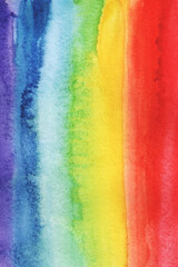 Rainbow watercolor painted on paper. Watercolor rainbow background.