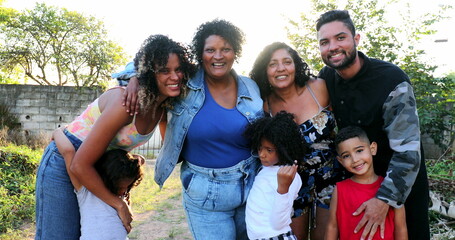 Fototapeta premium Family posing for photo. Hispanic latin south american family posing for camera
