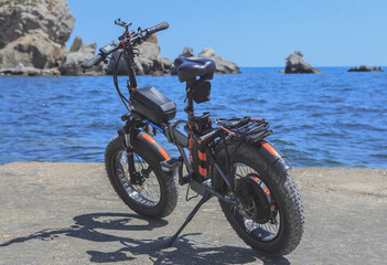 Fototapeta na wymiar Electric bike on the seashore