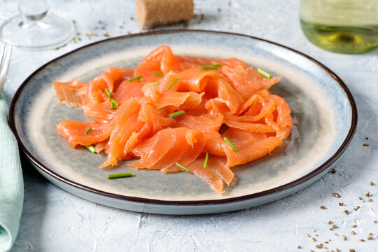 Slices of smoked salmon on the table.