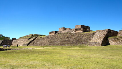 Low, stepped pyramid in the ruins of Monte Alban, in Oaxaca, Mexico