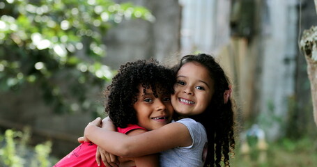 Children hugging love and affection. Mixed race diverse ethnicity