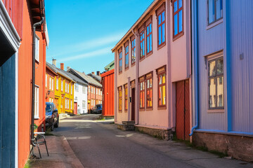 Street with colofful houses in Roeros, Norway