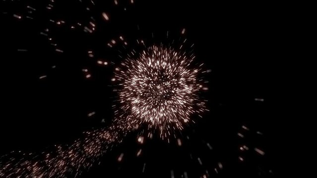 This stock motion graphic shows a fireworks display of golden particles on a dark background. This abstract background will decorate your projects related to the holiday, festival, New year, Christmas