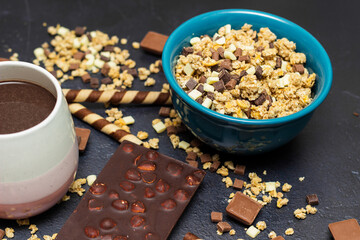 Chocolate granola cereals with chocolate milk and waffle rolls