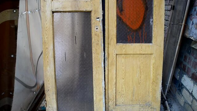 Repair of a facade. Old doors