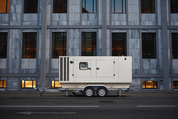 Mobile Diesel Generator is mounted on trailer provides backup electric power to the office building...
