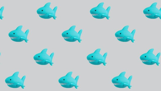Creative minimal loopable video of shark toys 4k.