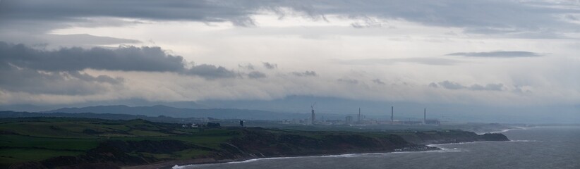 Sellafield nuclear power station from St Bees Head in the mist. A panorama.