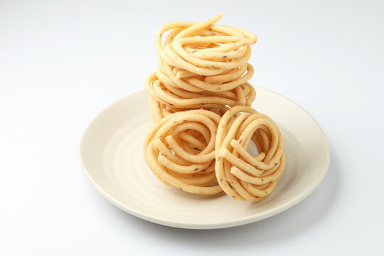 Murukku is a savoury snack popular in south India and Sri Lanka. murukku also known as chakli south indian traditional vegetarian snack