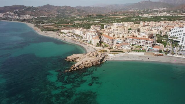 The drone aerial footage of Nerja,  Andalusia, Spain. Nerja is a municipality on the Costa del Sol in the province of M&aacute;laga in the autonomous community of Andalusia in southern Spain.