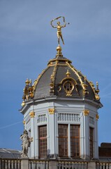 Vertical shot of the octagonal copper dome from the house of Boulangers in Brussels