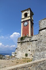 Clock tower in Greece, Corfu, Mediterranean Sea, vertical