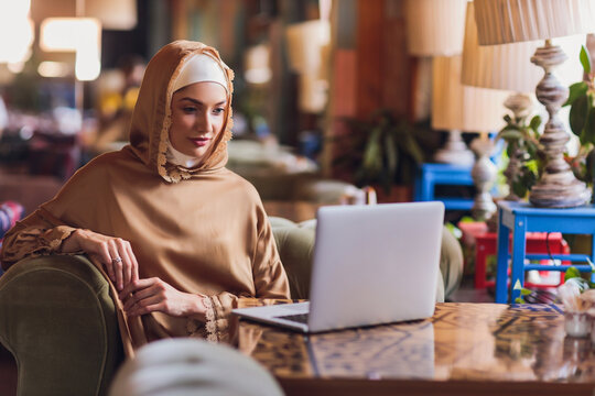 Beautiful Arabic Business Woman Working On Computer.