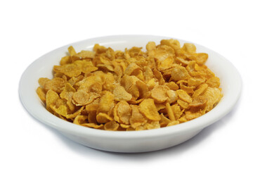 bowl of cornflakes isolated on white background.