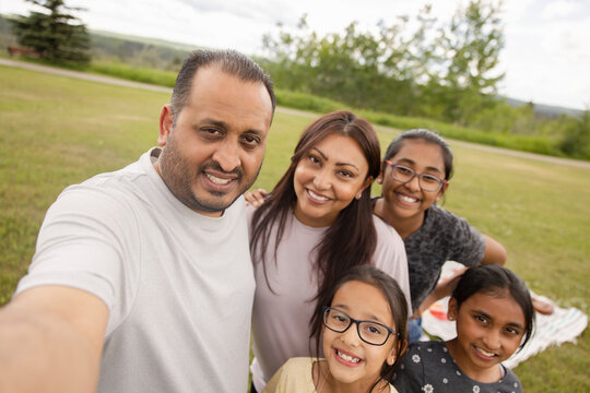 Selfie POV happy family in summer park