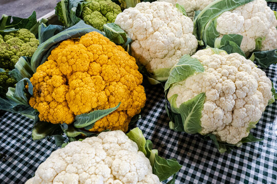 Cauliflower on a gingham cloth in the farmer's market