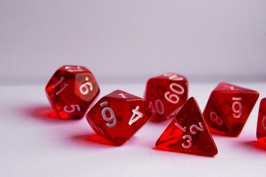 red cubes with percent sign, DnD dice set, d6 d4 d8 d10 d12 d20