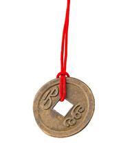 Chinese lucky old coin with red tape isolated on the white