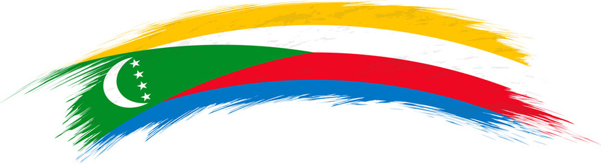 Flag of Comoros in rounded grunge brush stroke.