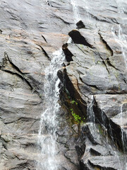 Hickory Nut waterfall in the mountains at Chimney Rock State Park