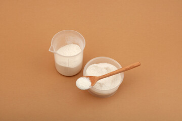 Hydroxybutanedioic acid or malic acid powder. Chemical formula C4H6O5. Food additive E296 of natural origin use in the preparation of soft drinks and confectionery