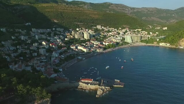 Aerial view of Adriatic coastal town Petrovac na moru and fortress Castello in Montenegro