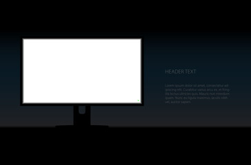 Turned the monitor screen on in the darkness. Copy space area for image on screen and text block next to.