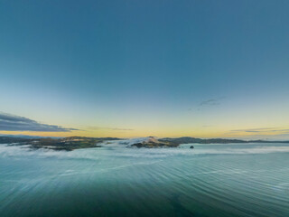 Drone shot of Sea level cloud inversion 