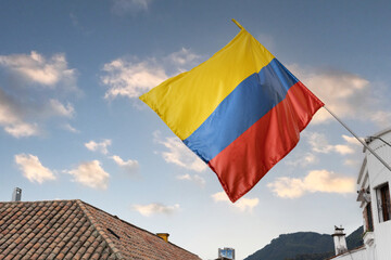 Colombian flag waving in urban area