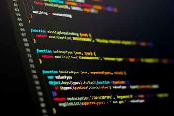 Frontend Code background. Javascript language coding is on the screen.	