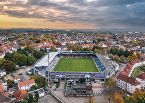 Aerial autumn view of Stadion an der Bremer Br&uuml;cke, home stadium for football club VfL Osnabr&uuml;ck. Osnabr&uuml;ck, Germany - October 2022
