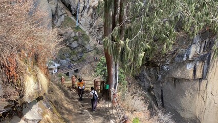 Peope are climbing Tiger Nest in Bhutan