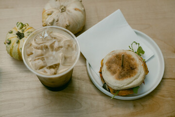 iced coffee and breakfast sandwich