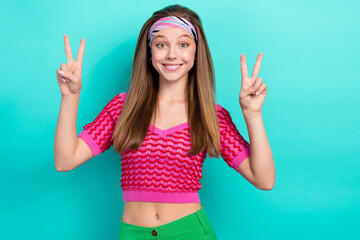 Photo of optimistic friendly hippie girl straight hairdo wear pink top showing v-sign greetings...
