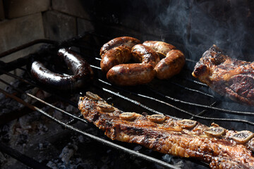 Barbecue, grilled sausages and cow meat , traditional argentine cuisine