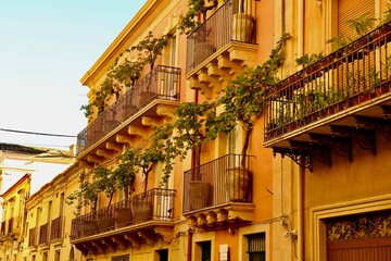 Fototapeta na wymiar Facade with balconies, Noto, Sicily 