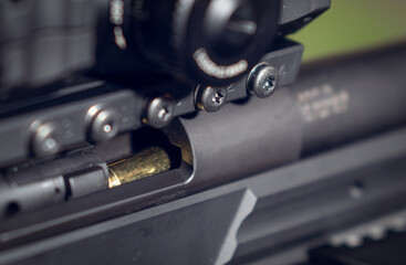 a sniper rifle with a charge in the chamber